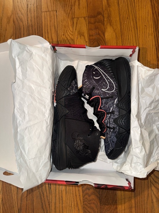 Nike Black Basketball Shoes with White Swoosh and Red Trim